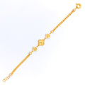 dazzling-clover-21k-gold-cz-bracelet