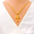 Fancy Flower Accented 22k Gold Cross Pendant 