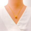 Distinctive Dynamic 21k Gold CZ Necklace 