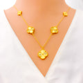 Refined Reflective 21k Gold Clover Necklace Set