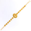 Mesmerizing Striped Oval 21k Gold Bracelet