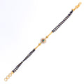 tasteful-stately-22k-gold-black-bead-bracelet