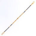 graceful-jazzy-22k-gold-black-bead-bracelet