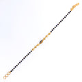 vibrant-charming-22k-gold-black-bead-bracelet