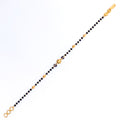 tasteful-fine-22k-gold-black-bead-bracelet