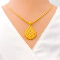 radiant-ornate-22k-gold-pendant-set