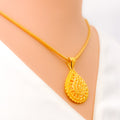 radiant-ornate-22k-gold-pendant-set