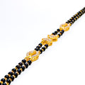 Elegant Bow 22k Gold Black Bead CZ Bracelet