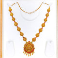 Elongated Leaf Adorned 22K Gold Lakshmi Necklace
