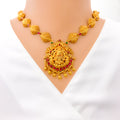 elongated-leaf-adorned-oxidized-22k-gold-lakshmi-necklace