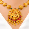 elongated-leaf-adorned-oxidized-22k-gold-lakshmi-necklace