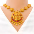 elongated-leaf-adorned-oxidized-22k-gold-lakshmi-necklace