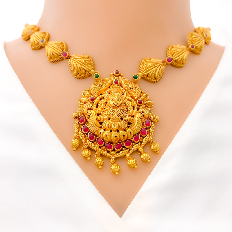 elongated-leaf-adorned-oxidized-22k-gold-lakshmi-necklace
