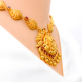 elongated-leaf-adorned-oxidized-22k-gold-lakshmi-necklace