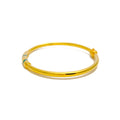 graceful-spiral-21k-gold-bangle-bracelet