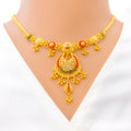 Vibrant Hanging Tassel 22k Gold Chand Necklace Set