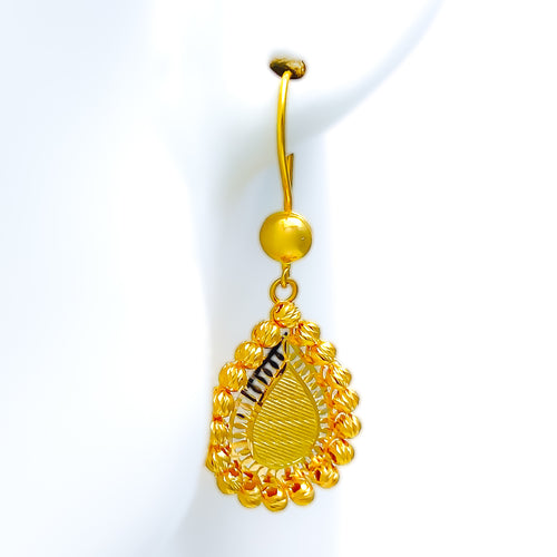 intricate-sleek-21k-gold-hanging-earrings