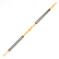 Lavish Textured 22k Gold Black Bead Bracelet 
