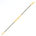 Refined Dotted 22k Gold Black Bead Bracelet 