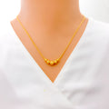 Charming Striped Orb 22k Gold Necklace 