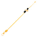 Dazzling Flower 22k Gold Black Bead Bracelet