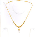 graduating-wavy-bead-21k-gold-necklace