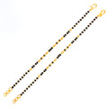 delicate-attractive-22k-gold-black-bead-baby-bracelet