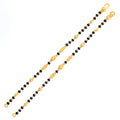 delightful-posh-22k-gold-black-bead-baby-bracelet