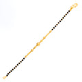 exquisite-vibrant-22k-gold-black-bead-baby-bracelet