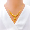 graduating-wavy-bead-21k-gold-necklace