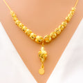 graduating-wavy-bead-21k-gold-necklace