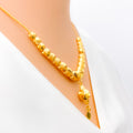 graduating-wavy-bead-21k-gold-necklace