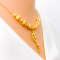 lavish-dangling-heart-21k-gold-necklace