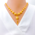 decadent-curved-orb-21k-gold-necklace