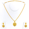 upscale-etched-22k-gold-pendant-set