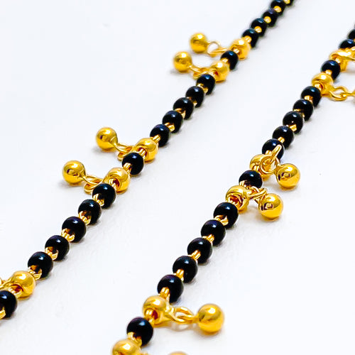 graceful-fashionable-22k-gold-black-bead-baby-bracelet