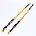 slender-chic-22k-gold-black-bead-baby-bracelet