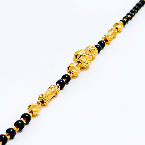 decorative-jazzy-22k-gold-black-bead-baby-bracelet