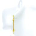 radiant-hanging-dove-22k-gold-earrings