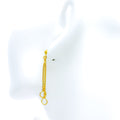stunning-dangling-halo-22k-gold-earrings