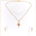 Radiant Dangling Drop 22k Gold CZ Pendant Set