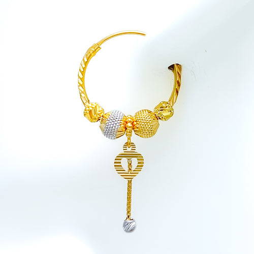 faceted-charming-22k-gold-hoop-earrings