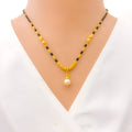 Sophisticated Pearl Drop 22k Gold Mangal Sutra 