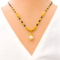 Sophisticated Pearl Drop 22k Gold Mangal Sutra 