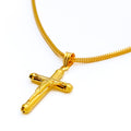 gleaming-22k-gold-cross-pendant