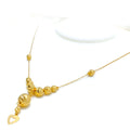 glossy-gorgeous-21k-gold-heart-necklace