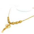 lavish-dangling-heart-21k-gold-necklace