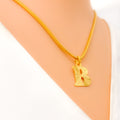 shimmering-22k-gold-letter-pendant