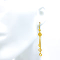 jazzy-elevated-21k-gold-hanging-earrings