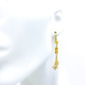 eternal-radiant-21k-gold-hanging-earrings